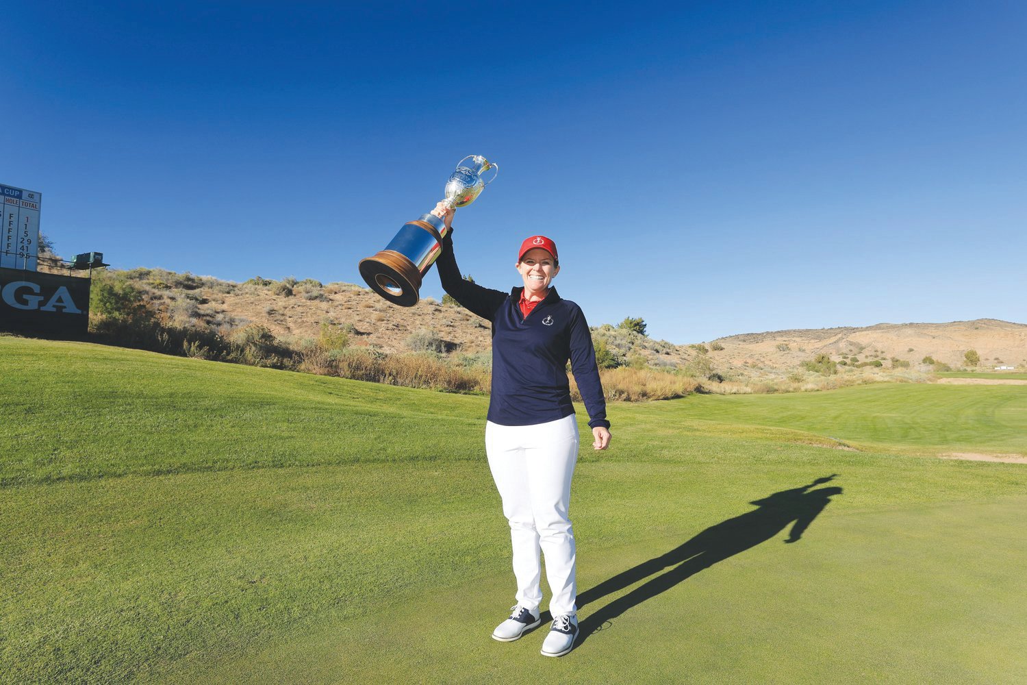 SANTA ANA PUEBLO, NM - OCTOBER 29: Stephanie Connelly-Eiswerth of Team USA poses for a photo with the Women's PGA Cup during the final round of the 2nd Women's PGA Cup at Twin Warriors Golf Club on Saturday, October 29, 2022 in Santa Ana Pueblo, New Mexico. (Photo by Sam Greenwood/PGA of America)